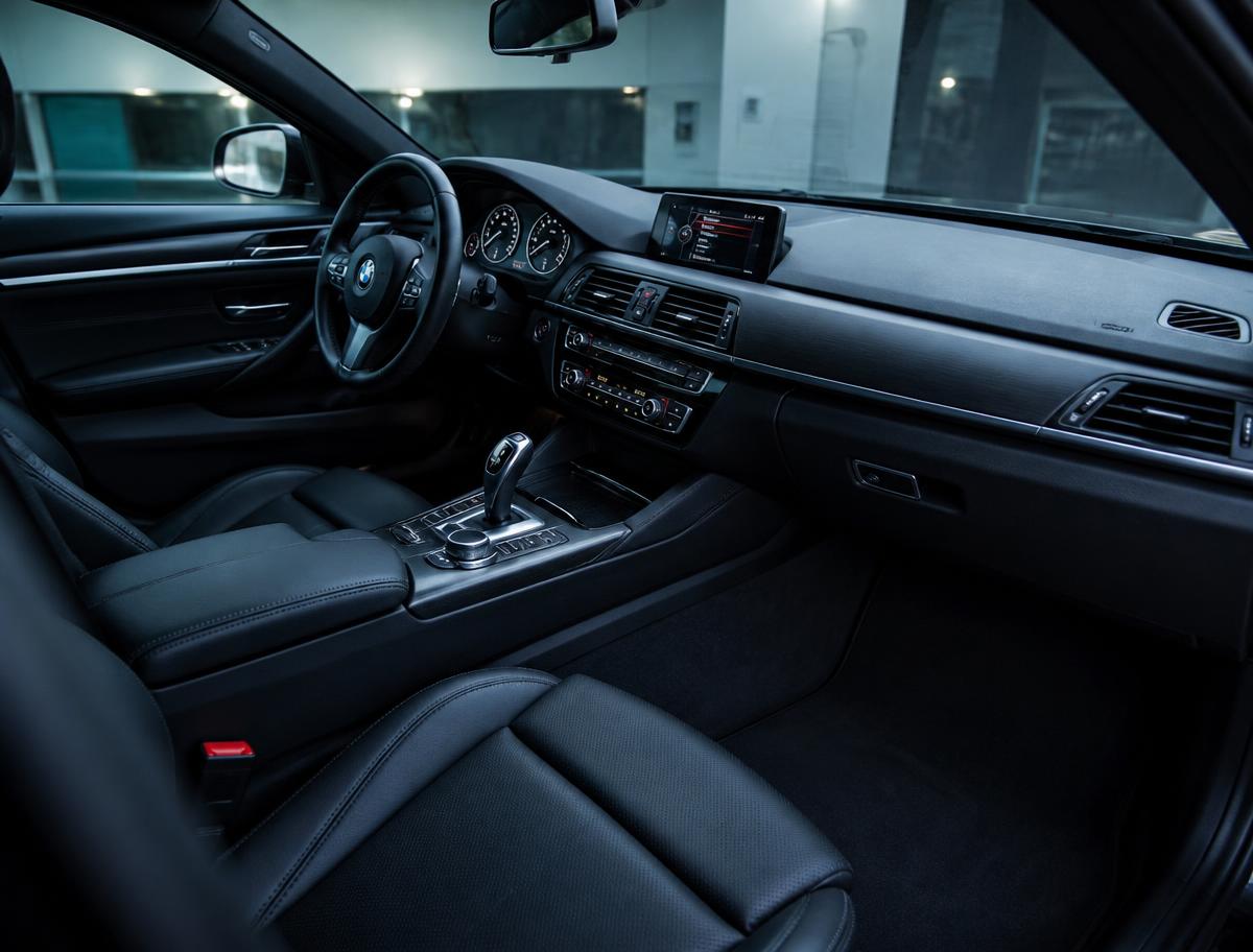 Spotless vacuumed car interior with a wiped dashboard
